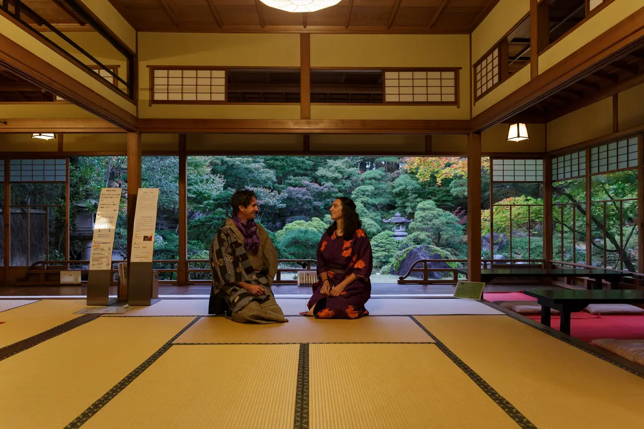A traditional room opening onto the garden at Saito Villa in Niigata City