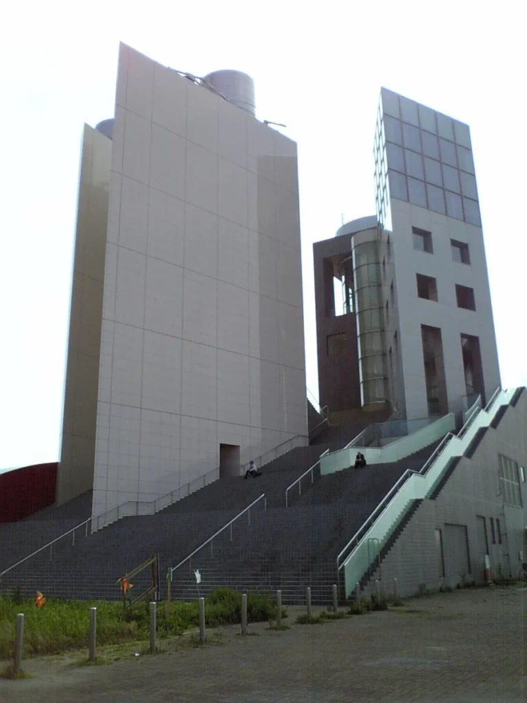 Historical exterior of Irifune Minato Tower beside its outdoor stairway
