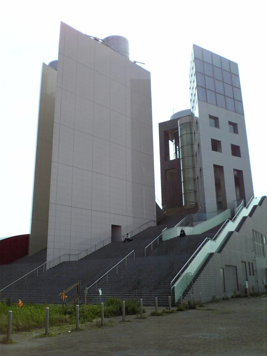 Historical exterior of Irifune Minato Tower beside its outdoor stairway