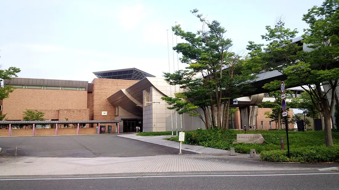 Entrance and tree-lined grounds of Niigata Prefectural Museum of Modern Art in Nagaoka